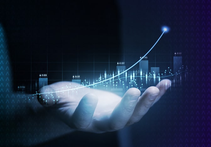 A hand - open palm - holding a hologram of a growth chart.